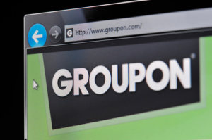 Münster, Germany - March 1, 2011: Groupon Website The website www.groupon.com is displayed on a computer screen.